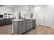 This kitchen island features stainless steel appliances and lots of storage at 2408 Blue Crane Circle, Myrtle Beach, SC 29577