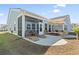 Outdoor patio with lounging and seating areas, ideal for relaxation and entertaining at 2408 Blue Crane Circle, Myrtle Beach, SC 29577