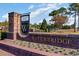 Elegant Waterbridge community entrance sign with brick and landscaped flower beds at 2409 Silkgrass Ln., Myrtle Beach, SC 29579