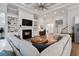 Inviting living room with a fireplace, built-in shelving, and comfortable seating at 2409 Silkgrass Ln., Myrtle Beach, SC 29579