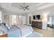 Spacious main bedroom with tray ceiling, a sitting area, and ample storage at 2409 Silkgrass Ln., Myrtle Beach, SC 29579