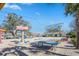 Fun beachfront scene featuring a playground area, ping pong table, colorful seating, and a view of the marina at 2557 Pete Dye Dr. # 702, North Myrtle Beach, SC 29582