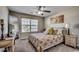 Well-lit bedroom featuring a large mirror and a colorful bedspread at 257 Leste Rd., Myrtle Beach, SC 29588