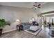 Bright living room with vaulted ceilings, stylish furnishings, and wood-look flooring at 257 Leste Rd., Myrtle Beach, SC 29588