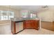 Stylish kitchen island with stainless steel dishwasher and granite countertop at 2960 Tigers Eye Rd., Little River, SC 29566