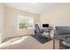 Home office showcasing a desk, chair, and abundant natural light at 2960 Tigers Eye Rd., Little River, SC 29566