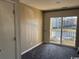 Bedroom featuring sliding glass doors that lead out to a balcony area at 300-F Myrtle Greens Dr. # 300-F, Conway, SC 29526