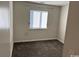 Bedroom featuring a window letting in natural light and neutral carpeting at 300-F Myrtle Greens Dr. # 300-F, Conway, SC 29526