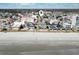 Aerial view showcases beach access, neighborhood, and ocean proximity for this coastal home at 308 24Th Ave. N, North Myrtle Beach, SC 29582