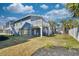 Backyard view shows the stilt construction, grassy yard, and convenient stair access at 308 24Th Ave. N, North Myrtle Beach, SC 29582