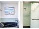 Updated bathroom features sleek black tub and shower with glass door at 308 24Th Ave. N, North Myrtle Beach, SC 29582