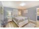 Cozy bedroom featuring a white queen bed, decor, and plenty of natural light at 308 24Th Ave. N, North Myrtle Beach, SC 29582