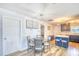 Cozy dining area adjacent to the kitchen with comfortable seating, perfect for Gathering meals and entertaining guests at 308 24Th Ave. N, North Myrtle Beach, SC 29582