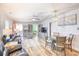 Bright open living space with hardwood floors, dining area, and comfortable furnishings at 308 24Th Ave. N, North Myrtle Beach, SC 29582