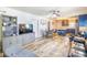 Open-concept living area with updated kitchen, dining area, and comfortable seating, creating a welcoming space at 308 24Th Ave. N, North Myrtle Beach, SC 29582