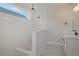 Modern bathroom featuring a walk-in shower with white subway tile, marble floors, and black fixtures at 319 Crossing Ct., Myrtle Beach, SC 29588