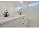 Modern bathroom featuring a double sink vanity with white cabinets, black hardware, and subway tile in the shower at 319 Crossing Ct., Myrtle Beach, SC 29588