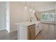 Kitchen island with a farmhouse sink and stainless steel dishwasher at 319 Crossing Ct., Myrtle Beach, SC 29588