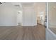 Bright living room featuring hardwood floors, recessed lighting, and an open floor plan at 319 Crossing Ct., Myrtle Beach, SC 29588