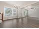 Bright living room featuring hardwood floors, recessed lighting, and an open floor plan at 319 Crossing Ct., Myrtle Beach, SC 29588