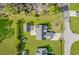 Aerial view of a well-maintained backyard and garden with a detached garage with a basketball hoop at 359 Rose Ave., Georgetown, SC 29440