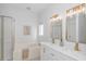 Bright bathroom with double vanity, soaking tub, and separate glass-enclosed shower at 359 Rose Ave., Georgetown, SC 29440