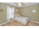 Cozy bedroom with window, twin bed, neutral tones, and comfortable decor at 359 Rose Ave., Georgetown, SC 29440