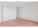 Bedroom featuring a ceiling fan, carpet and double door closet at 1501 Hallborough Dr., Surfside Beach, SC 29575