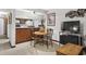 Dining area with table and chairs, open to the kitchen with tiled floor at 401 10Th Ave. S # C-3, Myrtle Beach, SC 29577