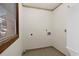 Empty laundry room features tile floors, a window and neutral walls at 401 10Th Ave. S # C-3, Myrtle Beach, SC 29577