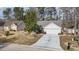 An aerial view of a lovely one story home with an attached two car garage and a well manicured lawn at 4030 Manor Wood Dr., Myrtle Beach, SC 29588