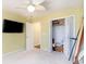 Bedroom featuring a mounted television and walk in closet at 4030 Manor Wood Dr., Myrtle Beach, SC 29588