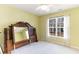 Bedroom featuring a large bed frame and a window with natural light at 4030 Manor Wood Dr., Myrtle Beach, SC 29588