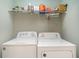 Laundry room with white front-loading washer and dryer at 4030 Manor Wood Dr., Myrtle Beach, SC 29588