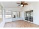 Sunroom with ceiling fan and exterior views at 4030 Manor Wood Dr., Myrtle Beach, SC 29588