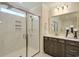 Bathroom showcasing tiled shower, vanity with storage, and a well-lit mirror for grooming ease at 4060 Bucolic Loop, Myrtle Beach, SC 29588