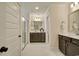 Bathroom featuring double vanities, a glass enclosed shower, and tile flooring for a modern appeal at 4060 Bucolic Loop, Myrtle Beach, SC 29588