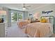 Bedroom features two beds, closet, carpeted floors, a ceiling fan, and a window for lots of natural light at 4060 Bucolic Loop, Myrtle Beach, SC 29588