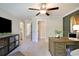 Well-lit home office with a ceiling fan, neutral carpet, and views into a walk-in closet and another room at 4060 Bucolic Loop, Myrtle Beach, SC 29588