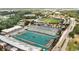 An aerial view showcasing Coastal Carolina University's football stadium and athletic facilities with surrounding greenery at 418 Clear Lake Dr., Conway, SC 29526