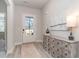 Bright entryway with a glass door, rustic console table, and light wood-look flooring at 418 Clear Lake Dr., Conway, SC 29526