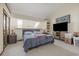 Vaulted bedroom featuring carpeted floors, neutral walls, sky lights, and large-screen television at 4497 Little River Inn Ln. # 1507, Little River, SC 29566