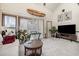 Inviting living room featuring high ceilings, neutral carpet, and natural light, creating a relaxing atmosphere at 4497 Little River Inn Ln. # 1507, Little River, SC 29566