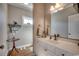 Cozy half bathroom featuring a modern vanity, sink, mirror, and decorative elements for guests at 4762 Cloister Ln., Myrtle Beach, SC 29577