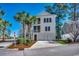 Charming three-story home with dual garage, double balconies and lush landscaping at 4762 Cloister Ln., Myrtle Beach, SC 29577