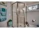 Updated bathroom featuring a tiled shower with bronze hardware at 4762 Cloister Ln., Myrtle Beach, SC 29577