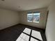 Bedroom with neutral carpet, neutral paint, a window, and white trim at 536 Tillage Ct., Conway, SC 29526