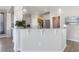 Stylish kitchen counter with pendant lighting, white cabinets, and modern countertops at 5519 Redleaf Rose Dr., Myrtle Beach, SC 29579