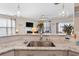 Open concept kitchen featuring a sink with views of the living area and outdoor space at 5519 Redleaf Rose Dr., Myrtle Beach, SC 29579