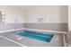 Indoor pool with brick pavers, pool rules signage and a hand rail at 5905 South Kings Hwy. # 6215D, Myrtle Beach, SC 29575